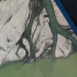 The watery arteries of an alluvial fan form an interesting abstract on Taku River.