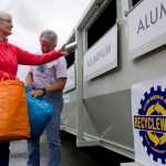 Linda and Richard Deakins take advantage of new recycling containers at The Alaska Club on Riverside on Tuesday. The City and Borough of Juneau waste management has rebranded its name to Recycleworks and has three locations for the new containers.