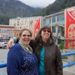 New owners of Alaskan Food Tours, Karen Wright, left, and Lucy Nelson pose before the Sealaska Heritage building, the last stop on the tour where tourists and locals can try Native foods.