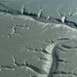 Drainage patterns in the mudflats of Cook Inlet, south of Anchorage, in early September.