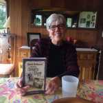 Karleen Grummett holds her soon to be released book "Quiet Defiance: Alaska's Empty Chair Story" which chronicles the history of the Japanese-Americans of Juneau who were incarcerated during World War Two and the community's response.
