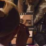 Annie Bartholomew applies makeup as she becomes Marty Wiener on Friday night, Sept. 30, 2016 during the Femme Fatale fundraiser for the Alaskan AIDS Assistance Association.