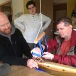 Tim Huber, right, plays the dulcimer. After his stroke, he couldn't move the right side of his body the same way. It was important to him to regain the ability to walk in the months after he woke up, so he focused more on his right leg than arm.