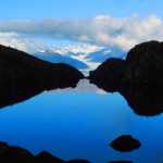 An infinity lake on top of Mt. Ben Stewart with the Mendenhall Glacier in the background.