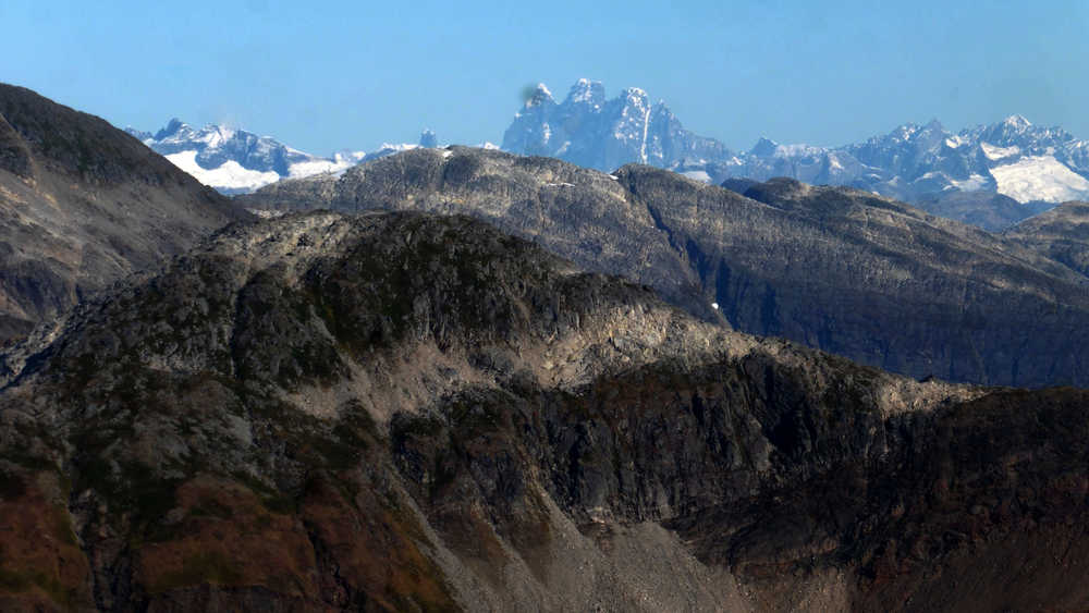 Devil's Thumb marking the border of the U.S. and Canada as seen from Sheep Mt.