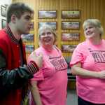 Cody Weldon reads the election results for his mother, Beth, right, and Gale Vandor in the Assembly chambers on Tuesday. Beth Weldon was elected after running unopposed.