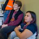 Sally Dybdahl, center, listens to her son, Josh Dybdahl, 30, and Anthony Lindoff, 36, tell their story at Bartlett Regional Hospital on Tuesday of being attacked by a brown bear sow with cubs on Chichagof Island during a deer hunting expedition on Saturday. Along with Dybdahl are Josh's girlfriend, Adrien Lee, and Jack Lee.