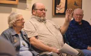 From left to right, Marie Darlin, former Juneau firefighter and ex-Mayor Merrill Sanford, and former Juneau firefighter Doug Boddy discuss Juneau's 20th century history of disasters as part of a panel on Saturday, Oct. 22, 2016 in the Juneau-Douglas City Museum.