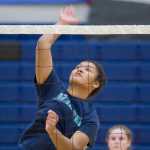 Junior Kyra Jenkins spikes a ball during Thunder Mountain High School varsity volleyball practice at TMHS on Wednesday.