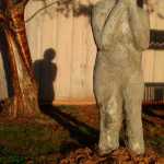 A sculpture that is part of a new public art installation Wednesday at Alaska Pacific University in Anchorage. The exhibit opening Friday features 43 of the statues, which were damaged by tides and high winds last year in another installation at a local beach and have since been restored.