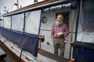 LaVern Beier talks about living on a boat since 1984 in Aurora Harbor on Friday, Nov. 4, 2016.