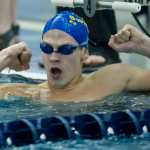 Kodiak's Talon Lindquist celebrates setting a new state record in the boys 200 yard freestyle race during the 2016 ASAA/First Natinal Bank Alaska Swim & Dive State Championships at the Dimond Park Aquatics Center on Saturday, Nov. 5, 2016. .