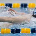 Thunder Mountain's Spencer Holt competes in the boys 200 yard medley relay during the 2016 ASAA/First National Bank Alaska Swim & Dive State Championships at the Dimond Park Aquatics Center on Saturday. Thunder Mountain won the race.