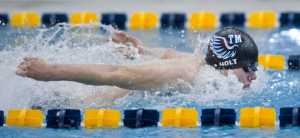 Thunder Mountain's Spencer Holt competes in the boys 200 yard medley relay during the 2016 ASAA/First National Bank Alaska Swim & Dive State Championships at the Dimond Park Aquatics Center on Saturday. Thunder Mountain won the race.