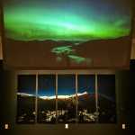 Above, time lapse video runs in a loop. Below, "Nocturnal Deer," a photograph of Deer Mountain.