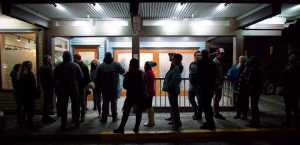 Invited guests wait in line outside of Rainforest Farms Second Street store to buy the first legal marijuana in Juneau on Wednesday, Nov. 23, 2016. The store is open to the public today.