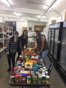 National Honor Society students from Thunder Mountain High School, under the supervision of Carol May, helped St. Vincent de Paul's package and distribute 350 Thanksgiving meals in three days.