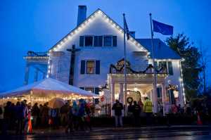 Juneau residents wait inline to attend the Governor's Open House on Tuesday, Dec. 8, 2015.