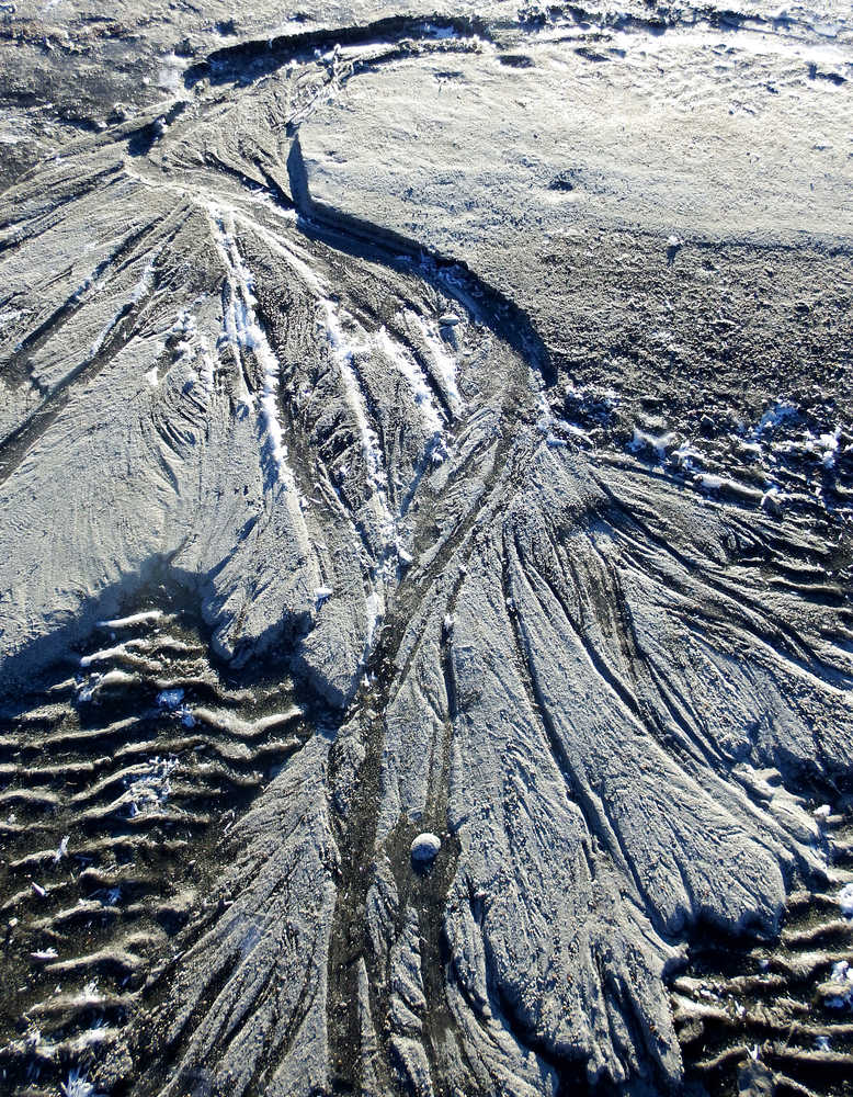 A mini delta a few feet in length but looking like a mighty river forms at the Mendenhall Glacier on Nov. 20.