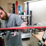 Assistant Rental Shop Supervisor Gage Acha works on a pair of skis on Thursday, Dec. 1, 2016, in preprepation for this weekend's opening at Eaglecrest.