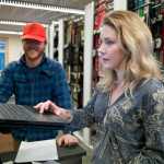 Rental Shop Supervisor Ben Hines goes over the shop's computer system with Kelsey Lovig on Thursday, Dec. 1, 2016, as they prepare for this weekend's opening at Eaglecrest.