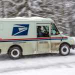 The mail has to get through - the US Mail delivery service hard at work out the road.