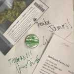 Pictured is the cannabis, signed bag, pin back button and receipt, donated by James Brooks to the Juneau-Douglas City Museum.