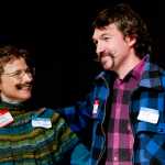 Patricia Hull and Sean Ottoson compete in the moustache portion of the second annual LumberJACC Beard & Moustache contest at the Juneau Arts & Culture Center on Friday.