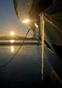 Icicles grow longer as the sun hugs the horizon at the Don D. Statter Memorial Boat Harbor in Auke Bay on Thursday, Dec. 15, 2016.