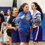 Nina Fenumiai, center, greets her teammates at the start of Thunder Mountain High School girls' basketball practice at TMHS on Tuesday, Dec. 13, 2016.