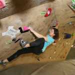 In this Dec. 8 photo, Emily Mengershausen demonstrates negotiating a black route at Ascension Rock Club in Fairbanks.