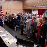 An honor guard from the U.S. Coast Guard presents the colors during the Electoral College vote casting ceremony at the Alaska State Museum on Monday, Dec. 19, 2016.