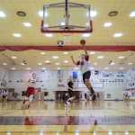 Juneau-Douglas's senior Bryce Swofford drives to the hoop during practice held Dec. 15 at the JDHS Gym.