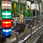 Danny Hartley works the variety pack boxing line at the Alaskan Brewing Company on Jan. 14, 2016. Much of Title 4, which regulates alcohol sales, hasn't been updated since 1980, and during that time, the alcohol industry has changed dramatically.