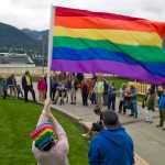 Supporters of the Southeast Alaska Gay and Lesbian Alliance rally at Marine Park before Monday evening Assembly meeting.