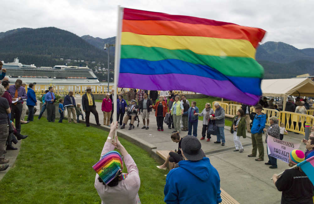 Supporters of the Southeast Alaska Gay and Lesbian Alliance rally at Marine Park before Monday evening Assembly meeting.