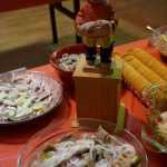 The much-sought-after pickled herring statue amidst the competing dishes.