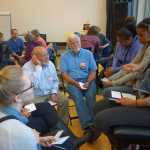 Group members listen as Skylar Wright speaks in a small group at "Racial Justice and Anti-Violence - A Creative Conversation."   Wright read a poem called "How Black Women Taught Me How to Love" at the event.