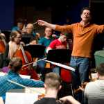 Music Director Troy Quinn leads a rehearsal with members of the Juneau Symphony for a 2016 concert.