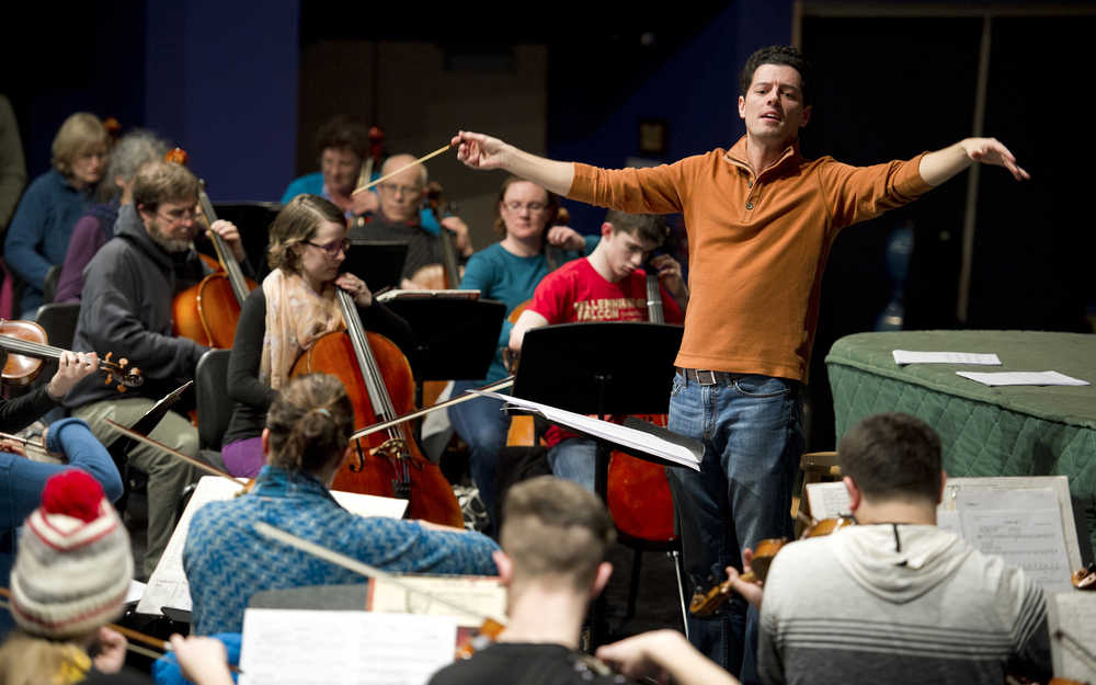 Music Director Troy Quinn leads a rehearsal with members of the Juneau Symphony for a 2016 concert.