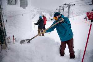 Kori Lane shovels snow at the top of the Black Bear Chairlift at Eaglecrest Ski Area on Monday. Eaglecrest had 4 inches of new snow at the top of the mountain on Monday. Skiers ride the Black Bear Chairlift at Eaglecrest Ski Area on Monday. Eaglecrest had 4 inches of new snow at the top of the mountain on Monday. Eaglecrest is open daily for the holidays through Monday, Jan. 9.