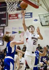 Juneau-Douglas' Bryce Swofford shoots over Valor Christian's Mason Taylor during the Captial City Classic on Wednesday, Dec. 28, 2016.