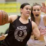 Criag's Molly Sharp, left, drives to the basket against Haines' Samantha Clay during their womens bracket game in the 2016 Juneau Lions Club 70th Gold Medal Basketball Tournament at Juneau-Douglas High School on March 24. Craig won 59-45.