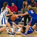 Thunder Mountain's Siniva Maka, center, and teammate Eva Tompkins, left, compete against Sitka's Tatum Bayne (2) and Hailey Denkinger for a loose ball during their game at TMHS on Jan. 14. Thunder Mountain won 40-39.