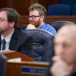 Rep. Justin Parish, D-Juneau, center, watches a practice session in the House of Representatives with other new legislators at the Capitol on Friday, Jan. 13, 2017.