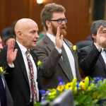 Rep. Jonathan Kreiss-Tomkins, D-Sitka, left, Rep. Dan Ortiz, I-Ketchikan, Rep. Justin Parish, D-Juneau, and Rep. Sam Kito, D-Juneau, are sworn-in by Lt. Gov. Byron Mallott on the first day of the first session of 30th Alaska Legislature at the Capitol on Tuesday.