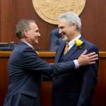 Sen. Kevin Meyer, R-Anchorage, left, turns over the Senate President's gavel to Sen. Pete Kelly, R-Fairbanks, on the first day of the first session of 30th Alaska Legislature at the Capitol on Tuesday.