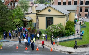 Juneau residents attend a tree planting reenactment ceremony for Alaska’s 50th Arbor Day at the Juneau-Douglas City Museum on Monday.