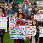 About 100 people attend a rally at Twin Lakes Wednesday evening in solidarity with the Standing Rock Sioux Tribe in North Dakota over the construction of the 1,172-mile Dakota Access pipeline.