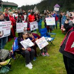 Ramona Gerber takes pictures as about 100 people attend a rally at Twin Lakes Wednesday evening in solidarity with the Standing Rock Sioux Tribe in North Dakota over the construction of the 1,172-mile Dakota Access pipeline.